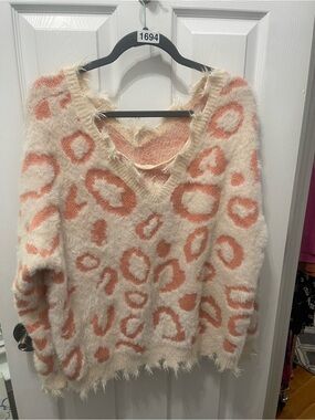 Soft Cream V-Neck Sweater with Coral Leopard Print